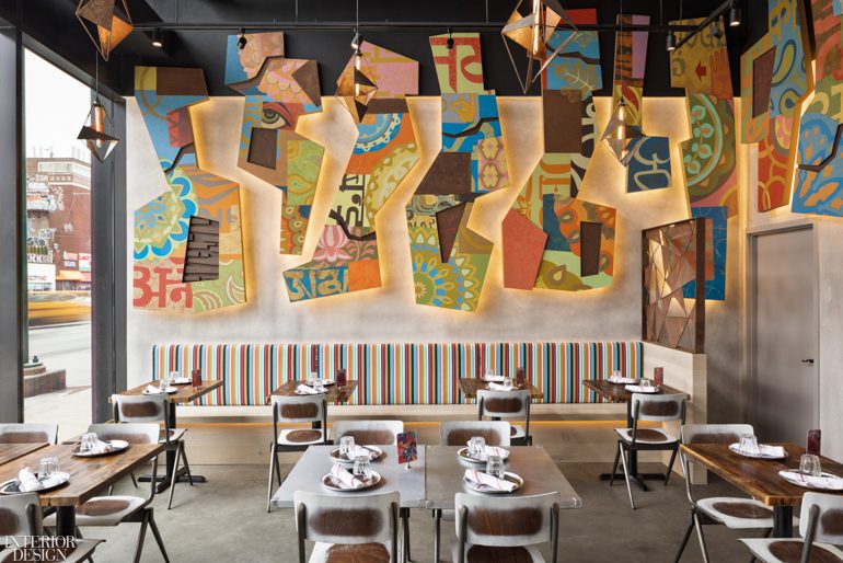 A vibrant mural in an Indian restaurant designed by Wid Chapman