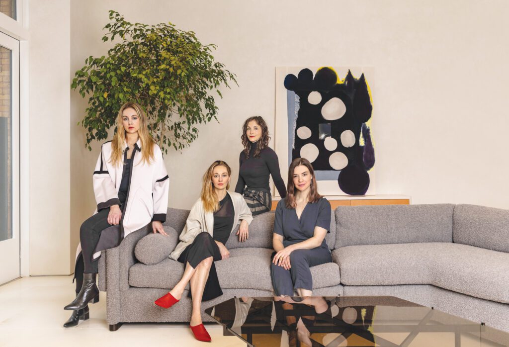 From left, curator Tealia Ellis Ritter joins Egg Collective partners Crystal Ellis, Stephanie Beamer, and Hillary Petrie in their New York showroom. Photography by Ori Harpaz.