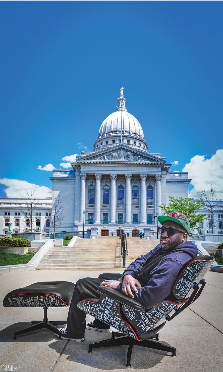 Michael Ford sits in one of his chair designs in front of the US Capitol 