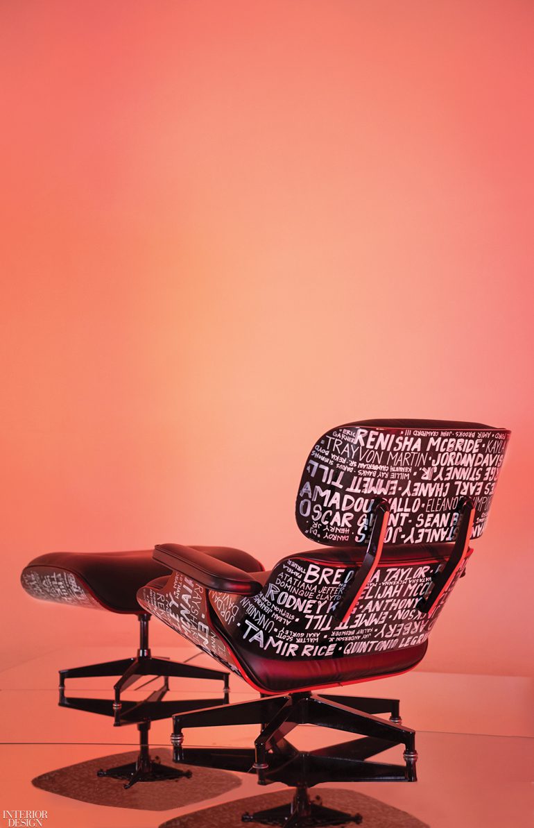 Ford's lounge chair with the names of victims of police brutality across the back and sides against an orange backdrop