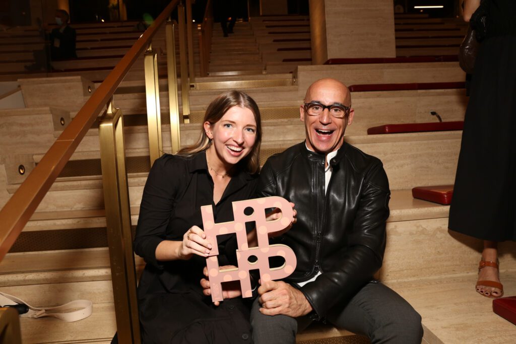 HiP Rising Star: Health and Wellness winner Mary Kate Cassidy with her HOK colleague Lifetime of Hipness: Workplace winner Bill Bouchey display their awards.