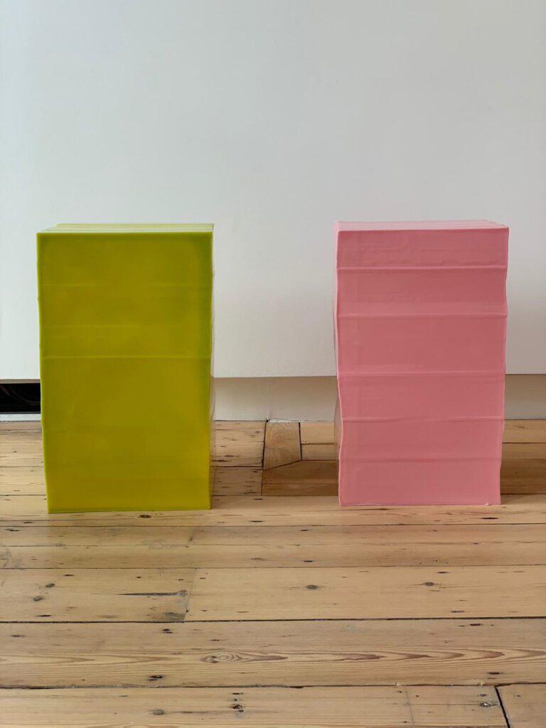 Green and pink block stools.