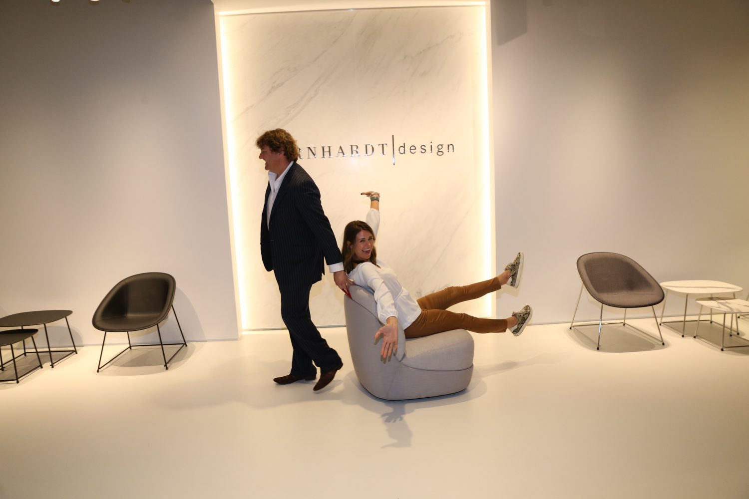 Clayton Oxford, director of marketing business production, and Tracy Bennett, sales, at Bernhardt Design with Automatic chair by Cory Grosser.