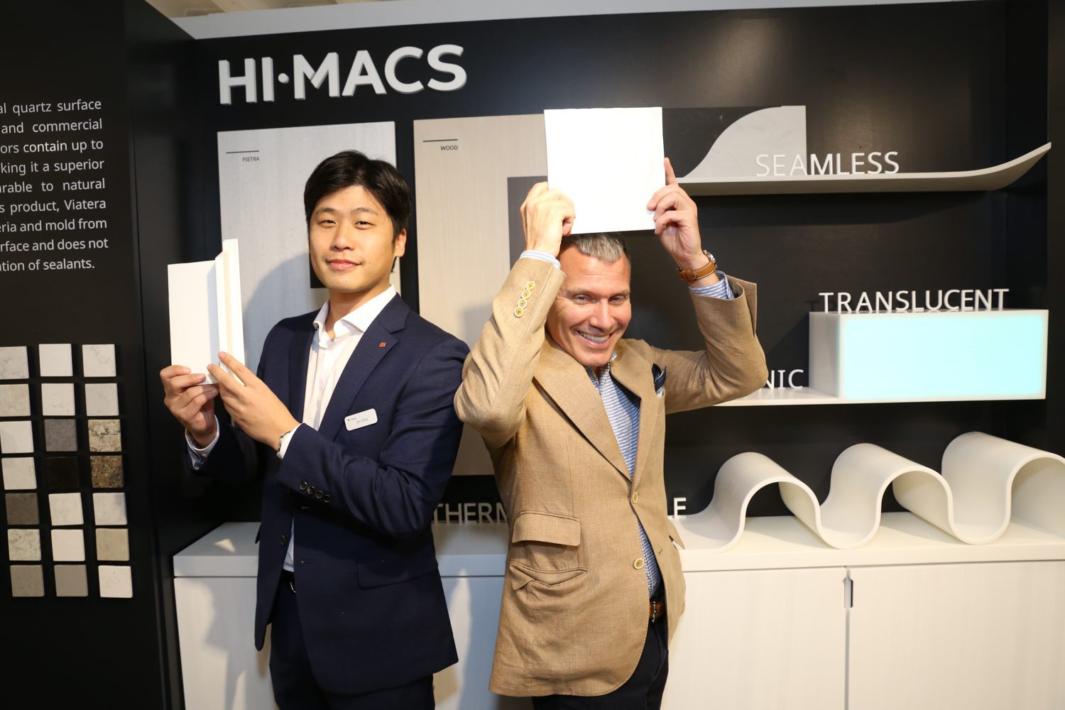 Jin Choi, product manager, and Michael Cook, sales, at LG Hausys with HI-MACS® solid surface tiles.