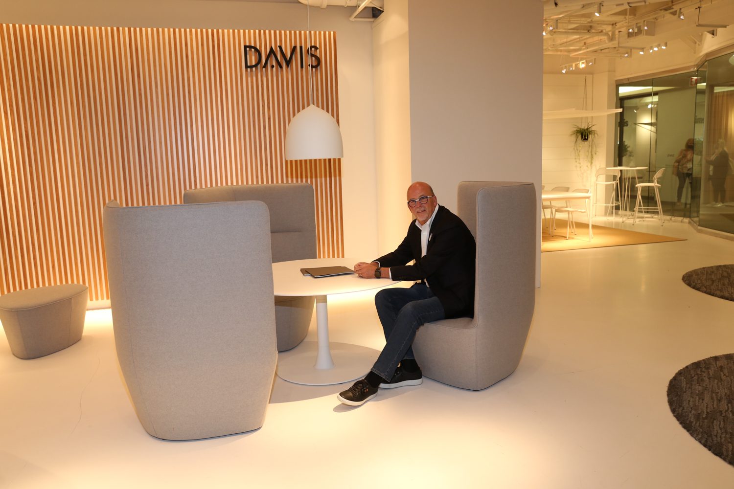 Danny Davis, president and owner of Davis Furniture with the brand's Quad lounge.