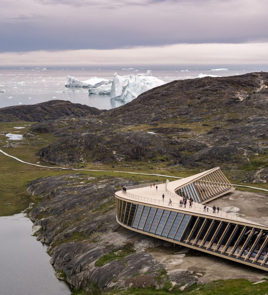 The roof of the 330-foot-long building functions as a deck for visitors to view icebergs in the Kangia Icefjord.