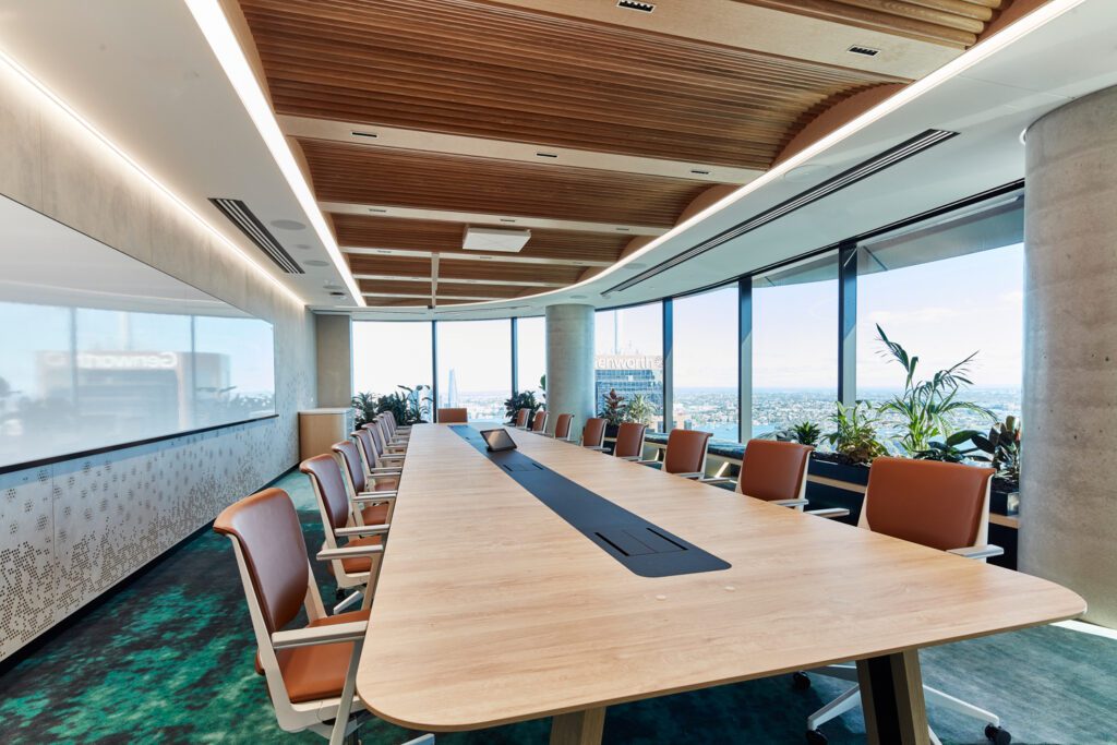 A custom Herman Miller table and Haworth seating gather in a 28th floor conference room. 