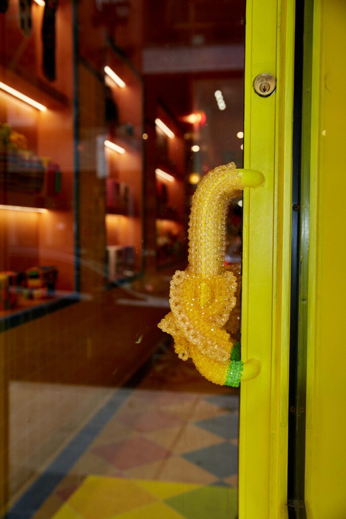 The bead encrusted banana door handle at the Susan Alexandra boutique.