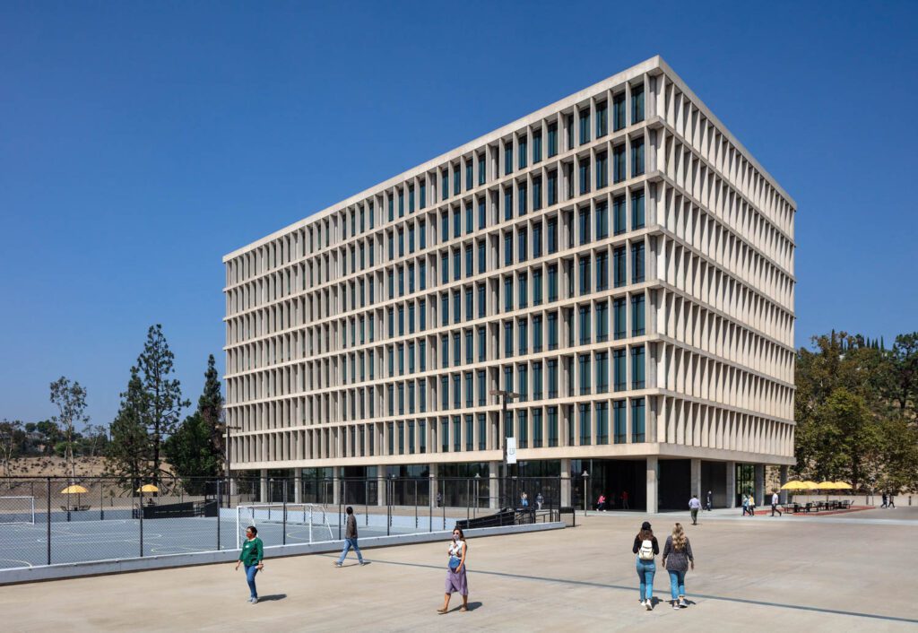 Students walk by the southern and eastern exterior of the building. Image courtesy of Magda Biernat.