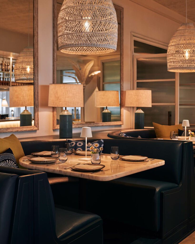 Indigo leather banquettes in the dining room face the ocean.