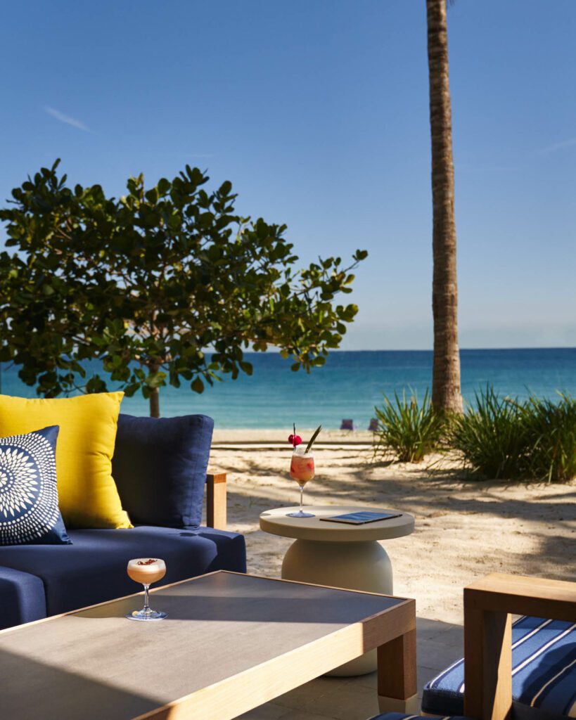 Beachside bar, also with ceramic tile front, and bleached oak stools.