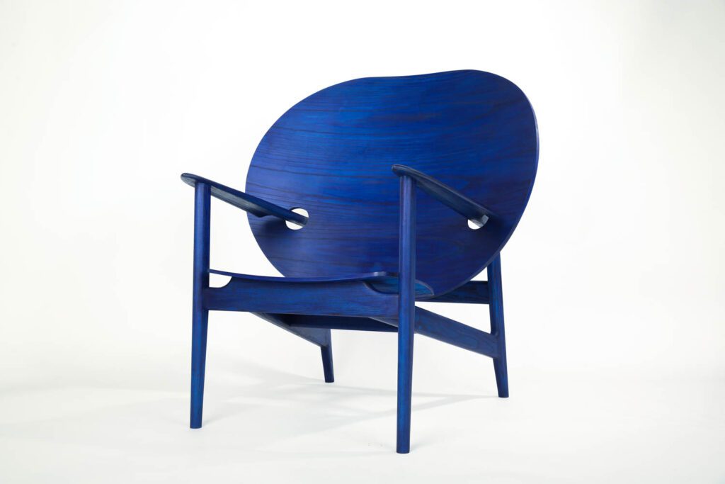 The brilliant blue of Collins’ first Iklwa chair references the Afrofuturist movement but also the colour of the bright ultramarine blue suit worn by his grandad when he first arrived in Britain from Jamaica. Photography courtesy of Mac Collins.