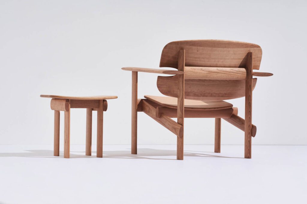 The Concur Chair was created by Collins for the Discovered project by American Hardwood Export Council (AHEC) and Wallpaper*. The chair has since been acquired by the Design Museum London for its permanent collection. It is made out of American cherry and its broad armrests suggest isolation and distance. Photography courtesy of Jason Yates.