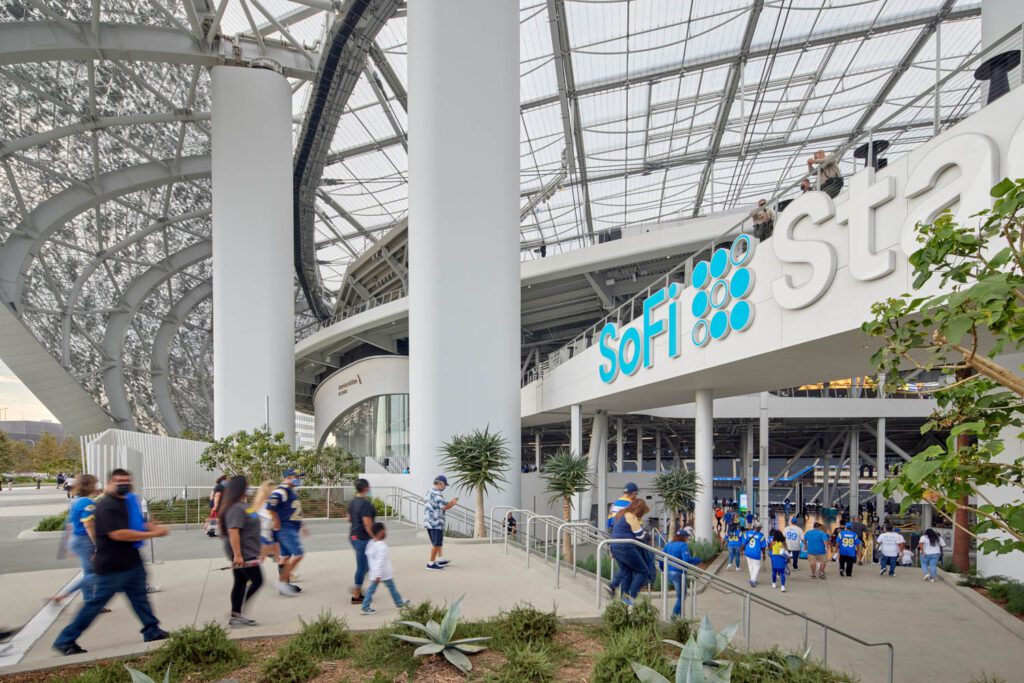 Visitors enter SoFi Stadium, the centerpiece of the 300-acre mixed-use parcel for sports, entertainment, retail, commercial, and residential. Photography by Bruce Damonte.