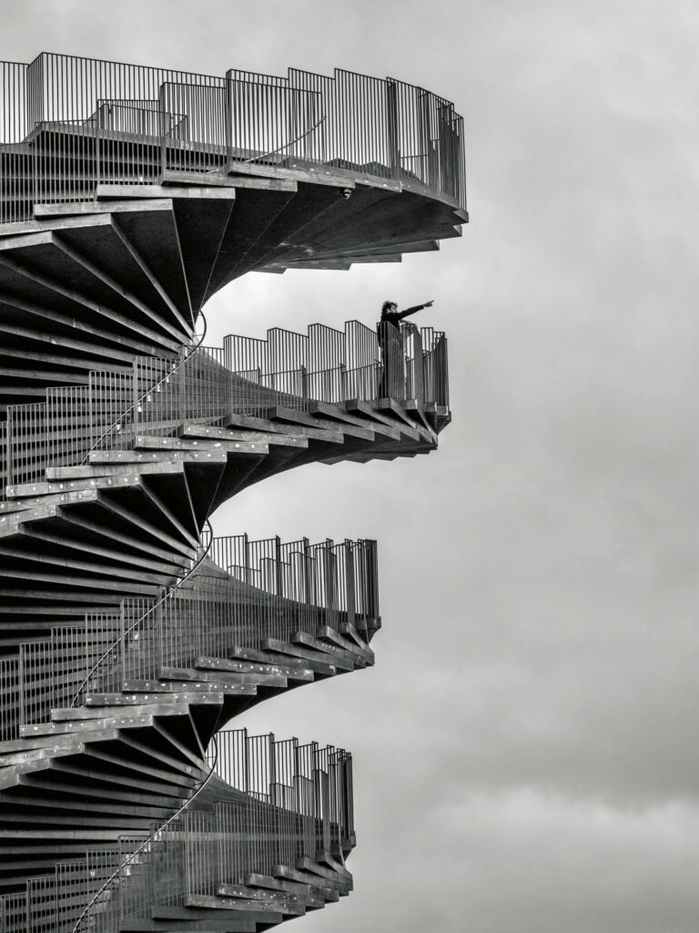 BIG–BJARKE INGELS GROUP: A double-helix pattern of 146 steps made from weathering steel ascends to the top of the 82-foot Marsk Tower in Denmark’s Wadden Sea National Park. Photography: Rasmus Hjortshøj/courtesy of BIG–Bjarke Ingels Group.