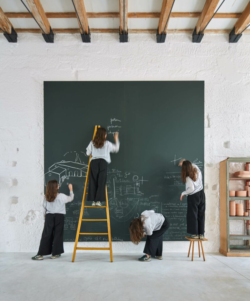 A 13-by-13-foot slate chalkboard