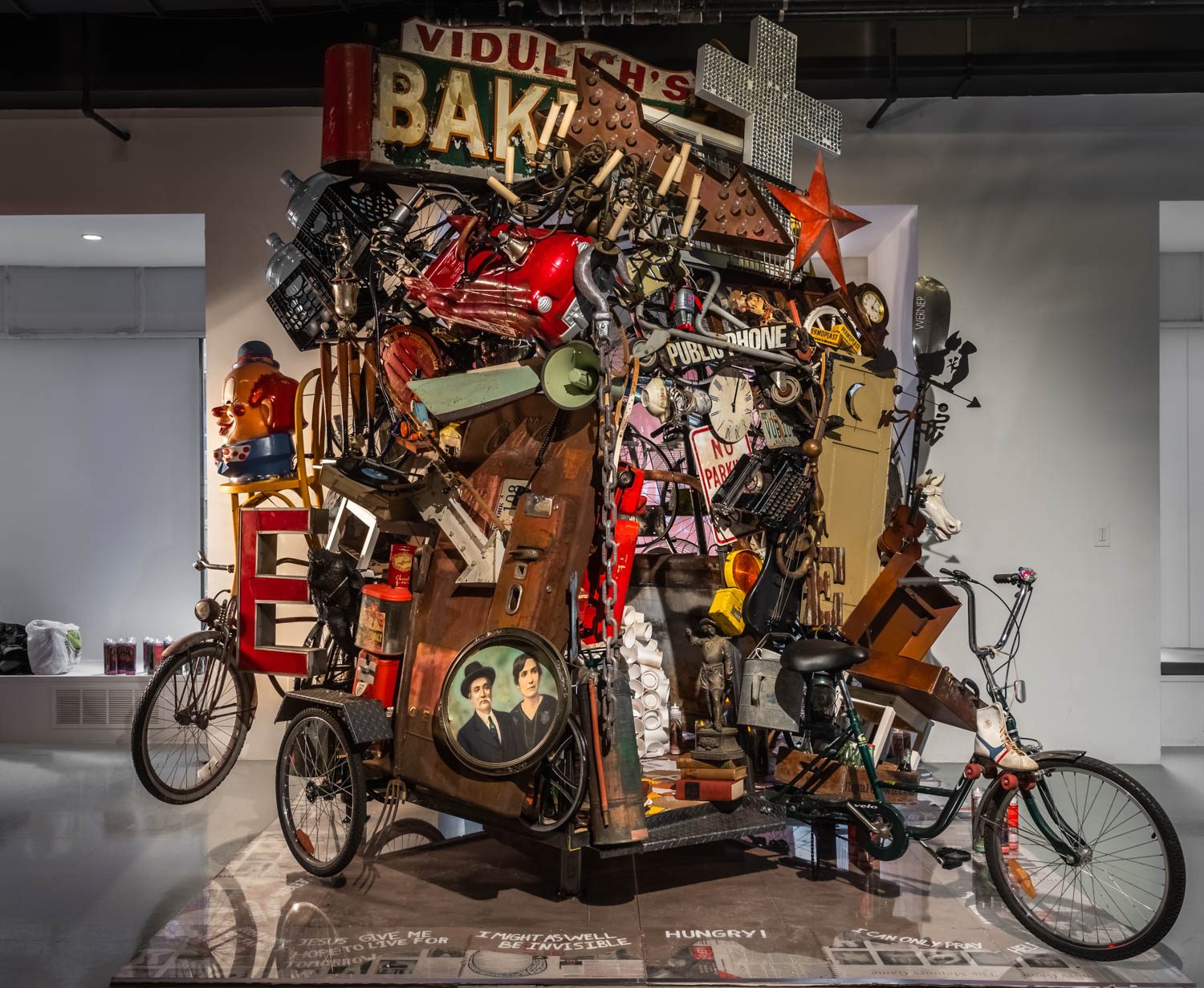 An installation of found objects and cardboard reflecting challenges of homelessness.