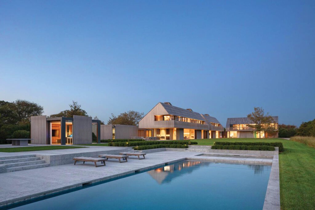 For geometric variety, the pool house has a flat roof rather than the saltbox form of the estate’s three residential structures.