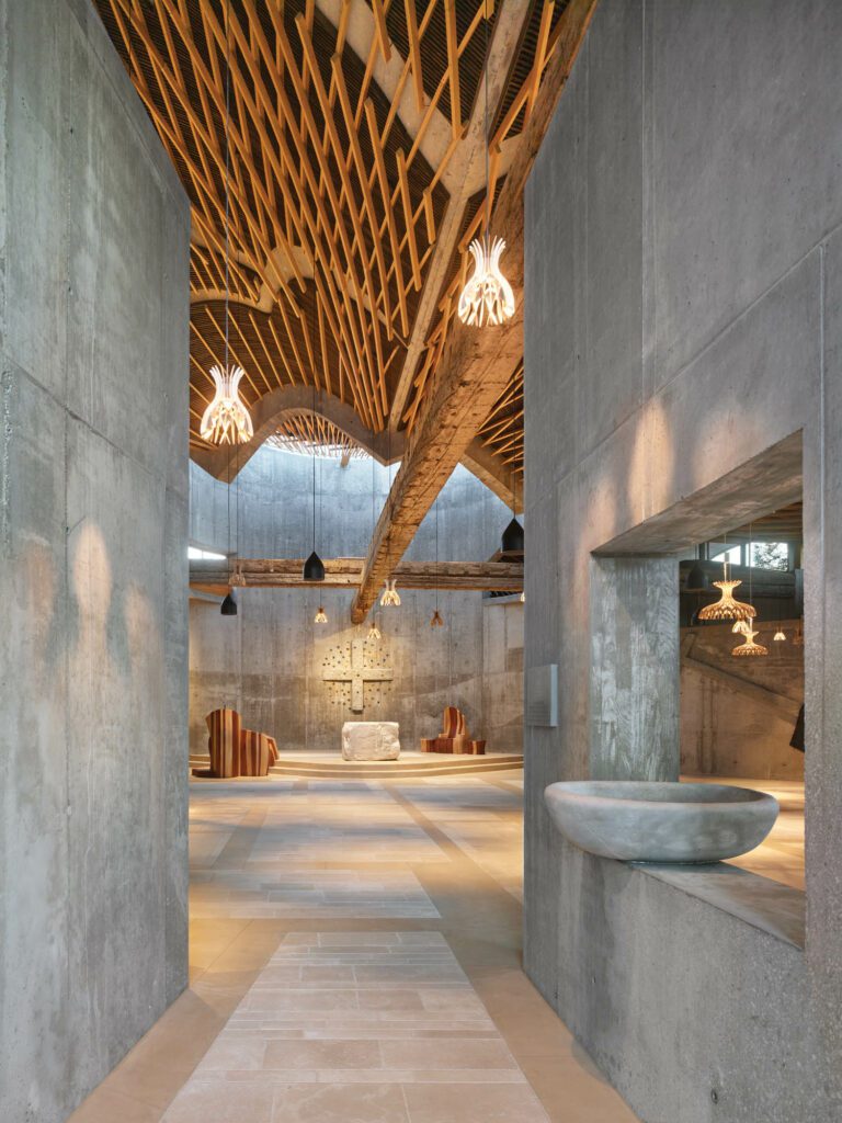 Raw concrete and cement composite form the interior envelope.