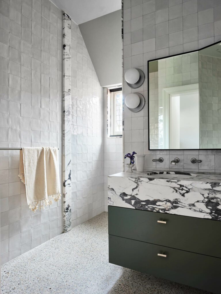 Moroccan Zellige tiles clad the walls of Peter’s terrazzo-floored bathroom.