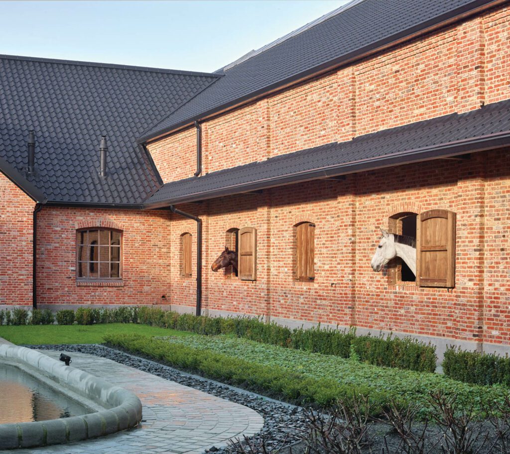 The firm also landscaped the property and added pathways of Belgian bluestone.