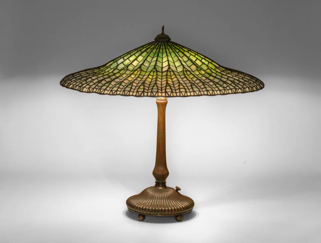 Tiffany Studios. (1902 -32) “Lotus” Table Lamp American, circa 1906. Leaded glass and bronze. 22” high x 26” diameter.