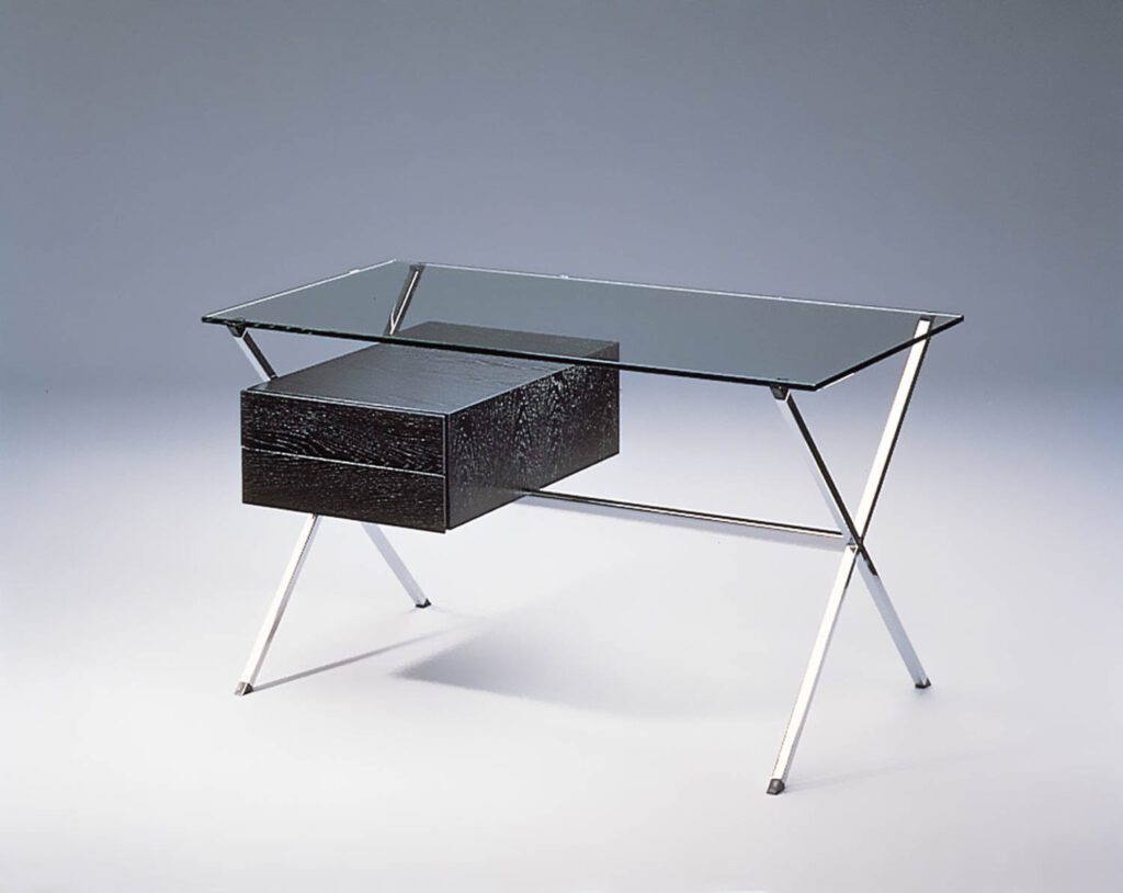 Franco Albini designs this desk for himself, two decades before it goes into production for Knoll.