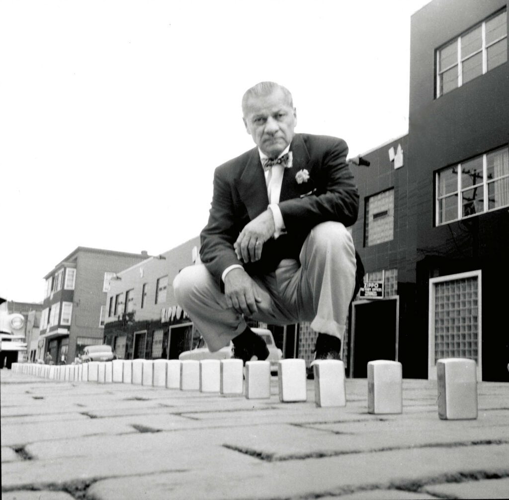 Zippo lighters set up like dominoes