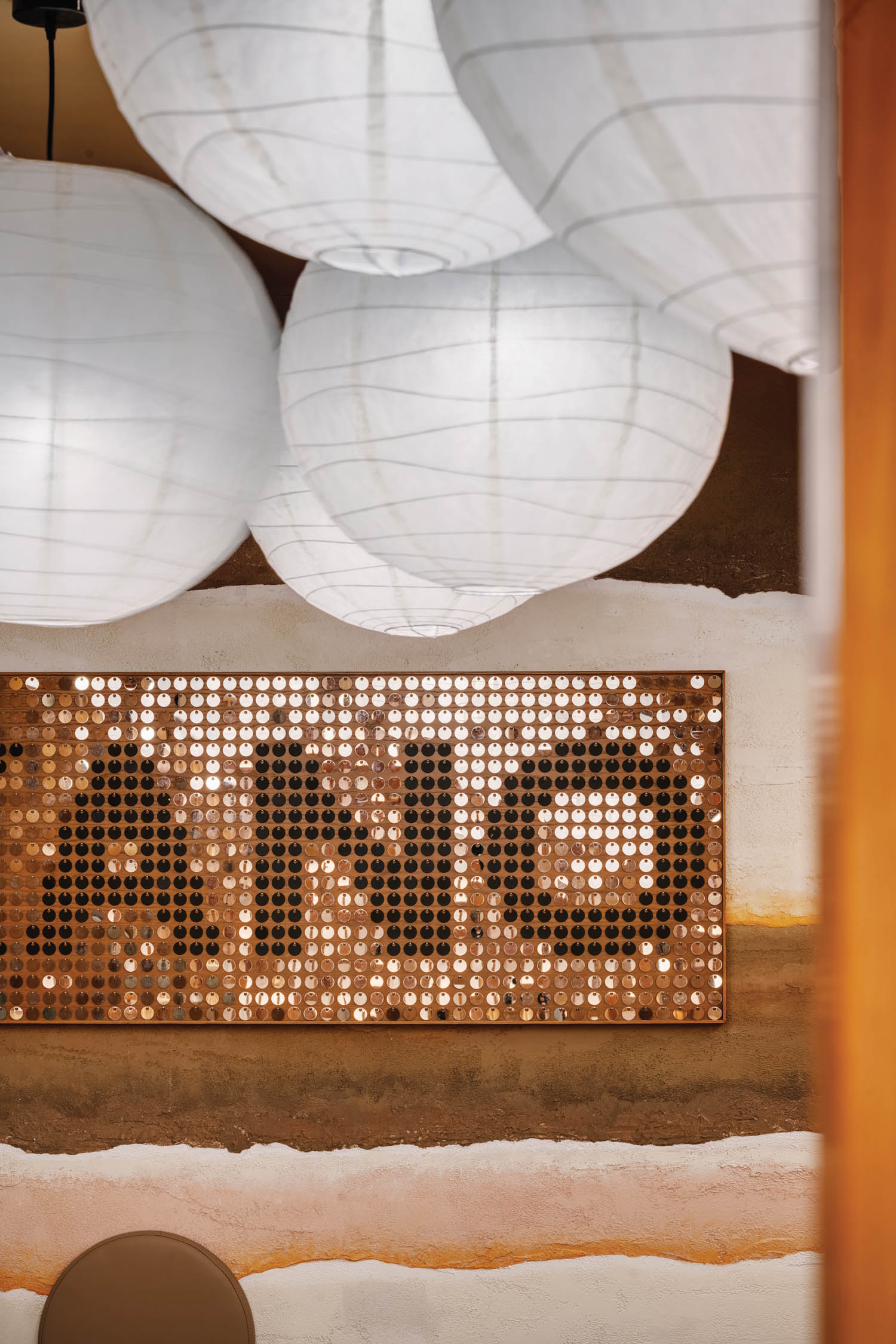 hanging lanterns are above a sign for Takano Ramen in Hong Kong