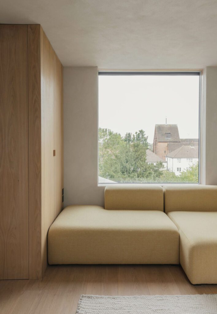 A Hay sofa offers views from the loft room. 