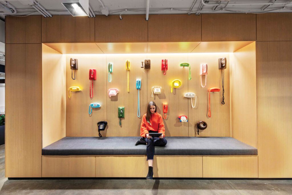 Ensconced in an oak-paneled banquette niche on the third floor, an installation by St. Louis artist Kelley Carman celebrates the landline telephone.