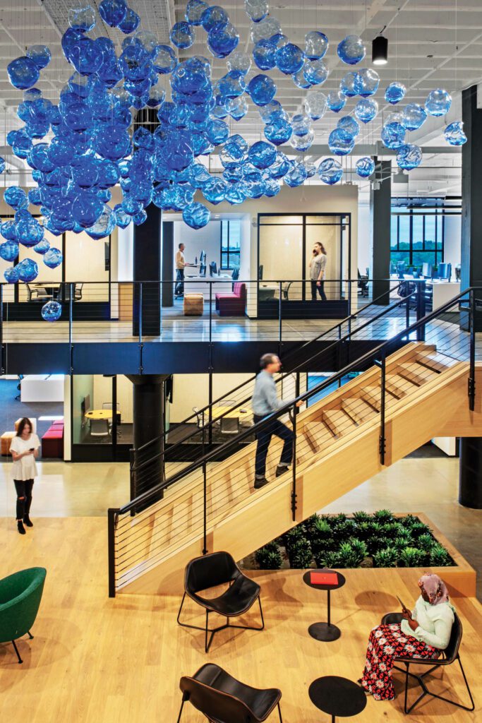 Representing drops of printer ink, a ceiling installation by Third Degree Glass Factory, a local studio started by artist and Block co-founder Jim McKelvey, animates one of the building’s three atria.