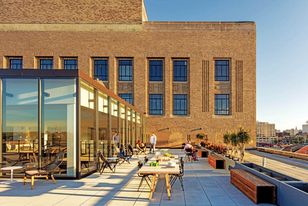 The roof terrace, a popular lunch spot overlooking downtown St. Louis, tops the building’s later addition.