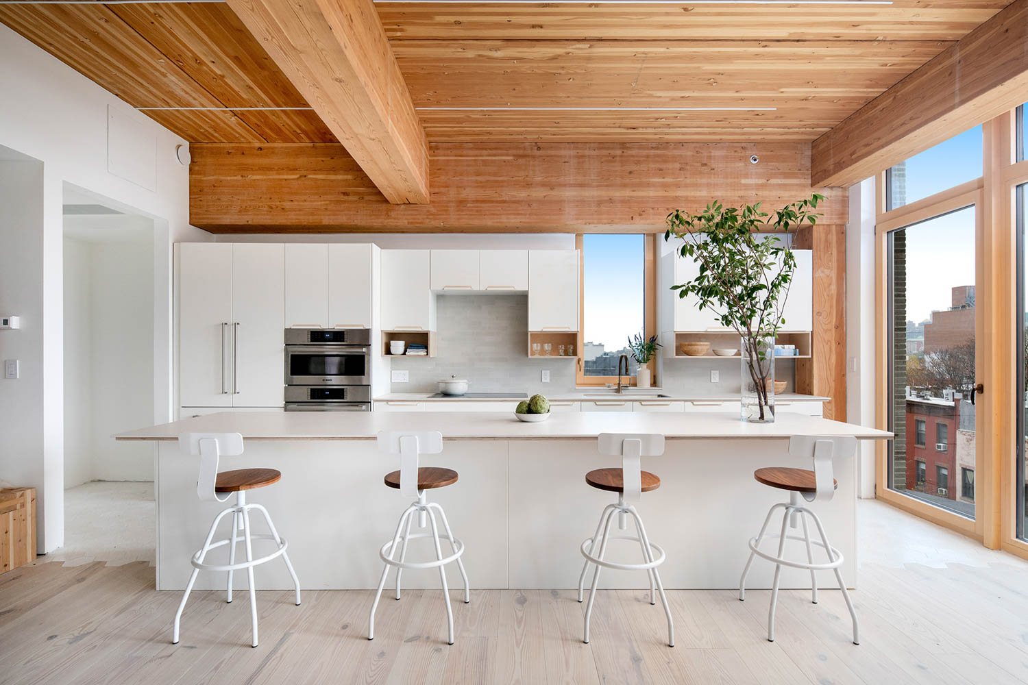 kitchen of modular home designs with lots of space and white countertops