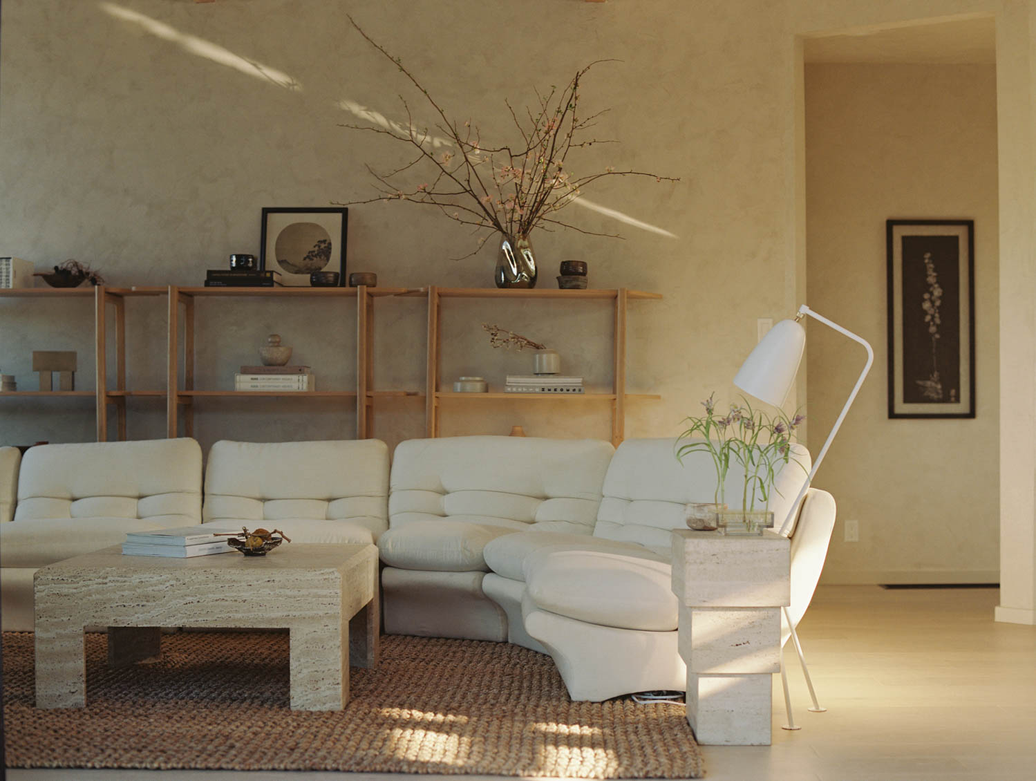 The 1980’s six-piece modular sofa is by Vladimir Kagan for Preview while the coffee table is Bernard Vuarnesson’s Hexa for Bellato.