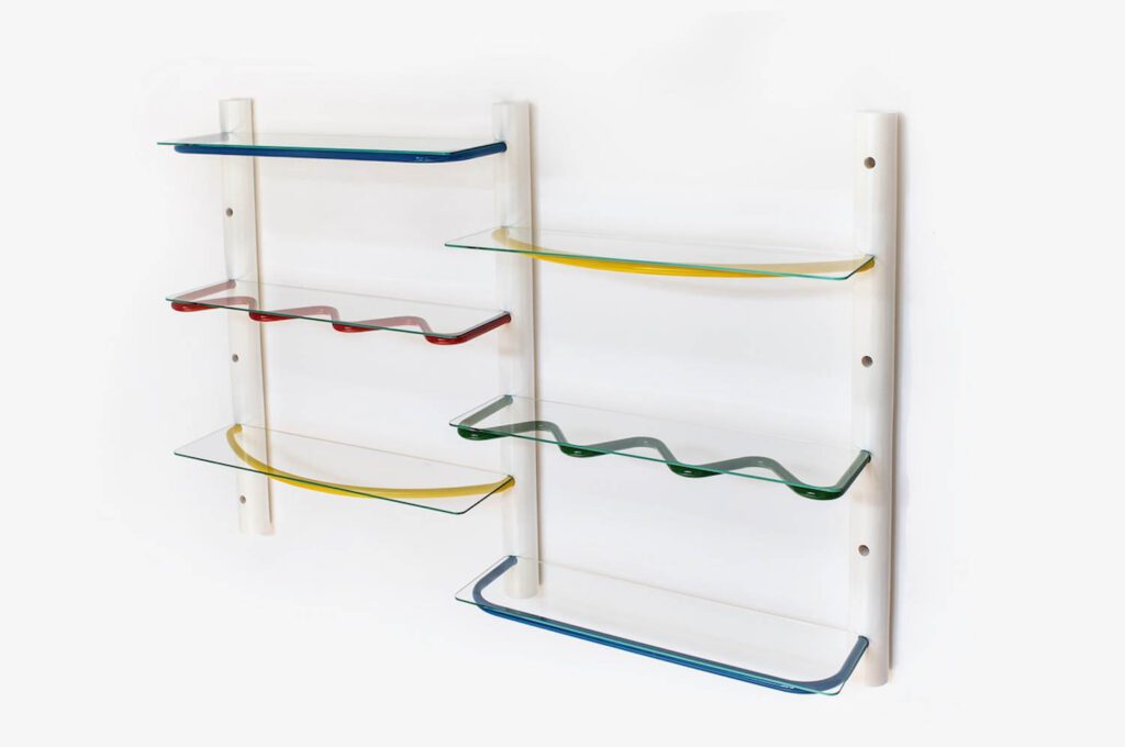 The metal and glass modular Waiting shelf by Amorces Studio reminds us of the colorful scribbles of childhood. 