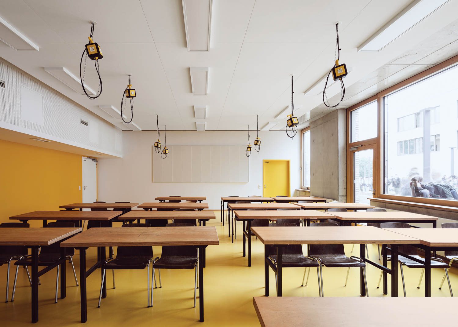 a classroom with yellow walls