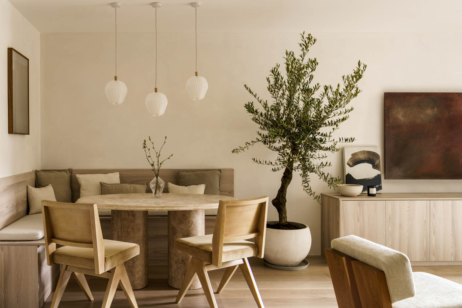 Table and Dining chairs by Tom Lawrence-Levy of Natural Asthetik; light pendants by Le Klint, Available via NaturalAsthetik.com; artwork by TYCJAN KNUT from Cadogan Contemporary.