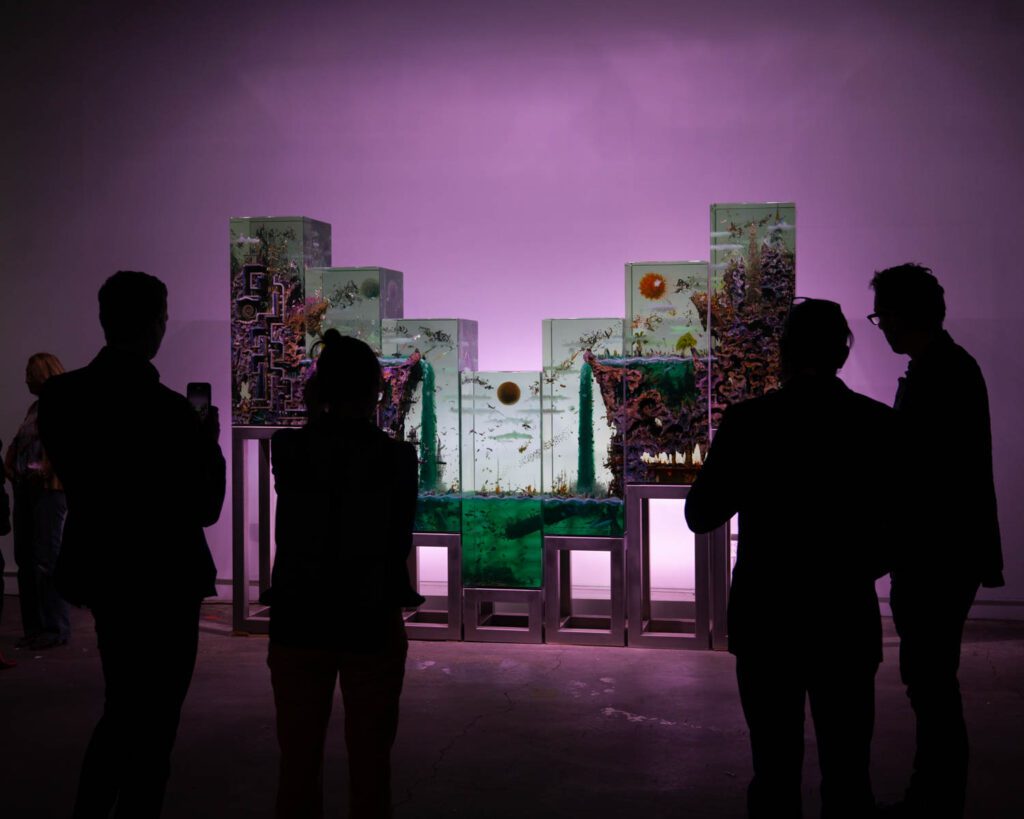 a room lit in the center with a purple background