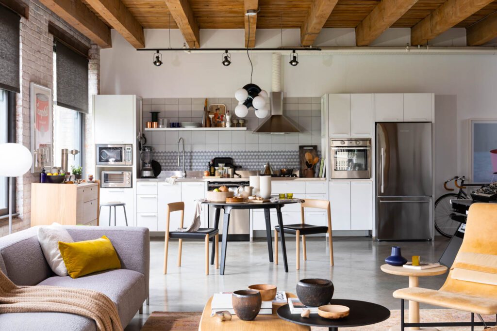 The kitchen area of the industrial loft features details from the 2004 renovation.