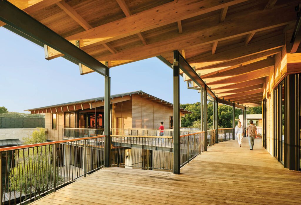 Open-sided boardwalks and bridges link the various classrooms.