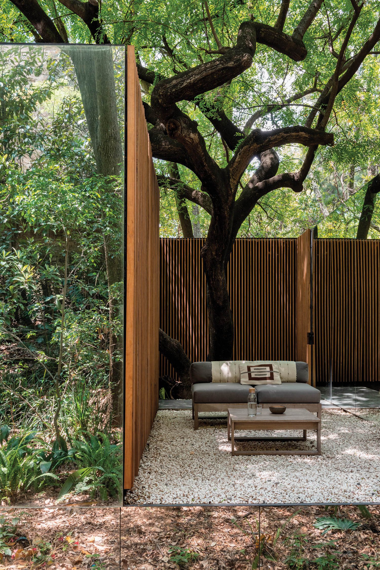 one of the home's courtyards with a seating area