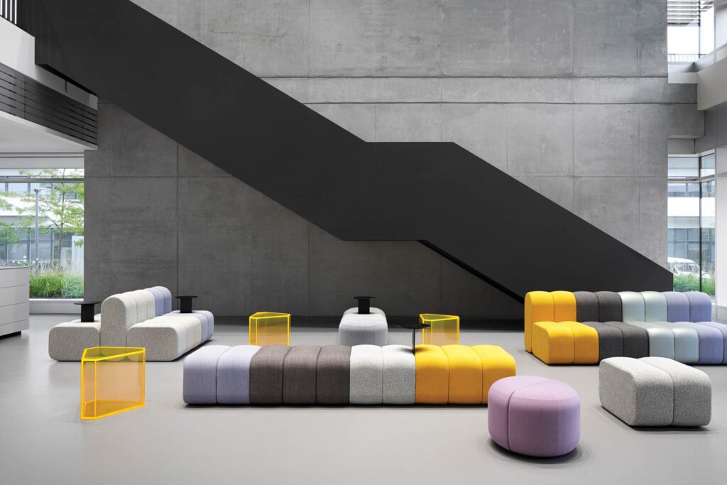 an entry room with colorful modular sofas