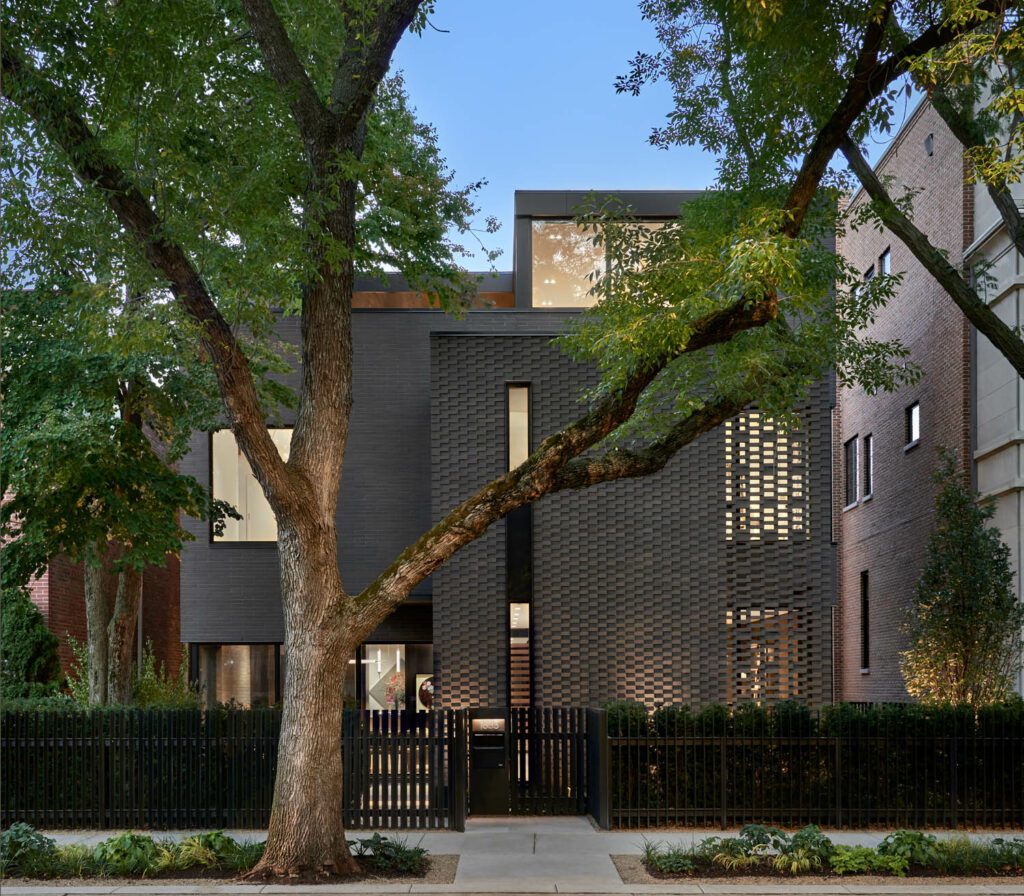 the exterior of the Chicago home behind a tree