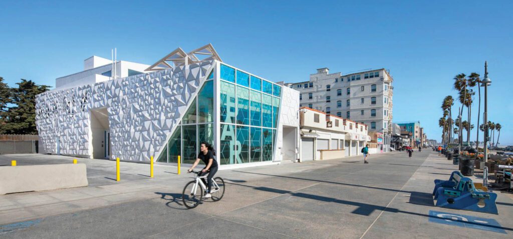 Panels of steel-framed ballistic glass wrap a corner of the building