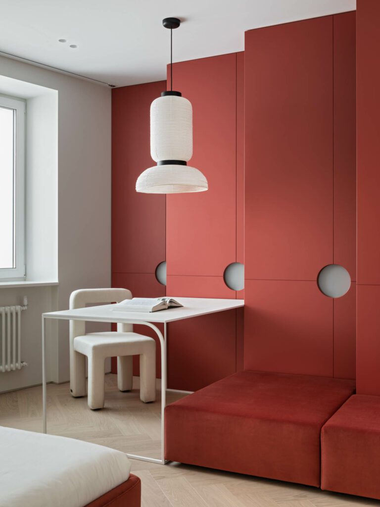 A custom desk with Faina chair underneath an &tradition pendant defines the eldest daughter’s room.