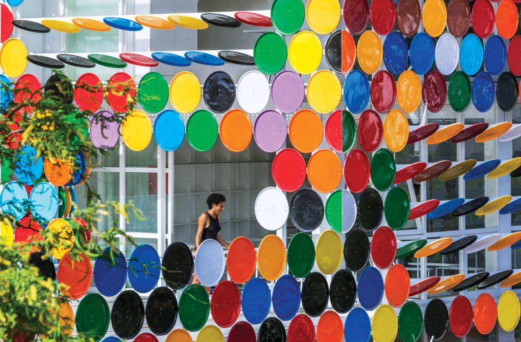 A rainbow assortment of painted steel lids