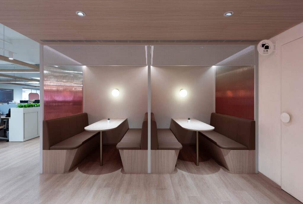 Gradient fluted glass form partitions for café seating