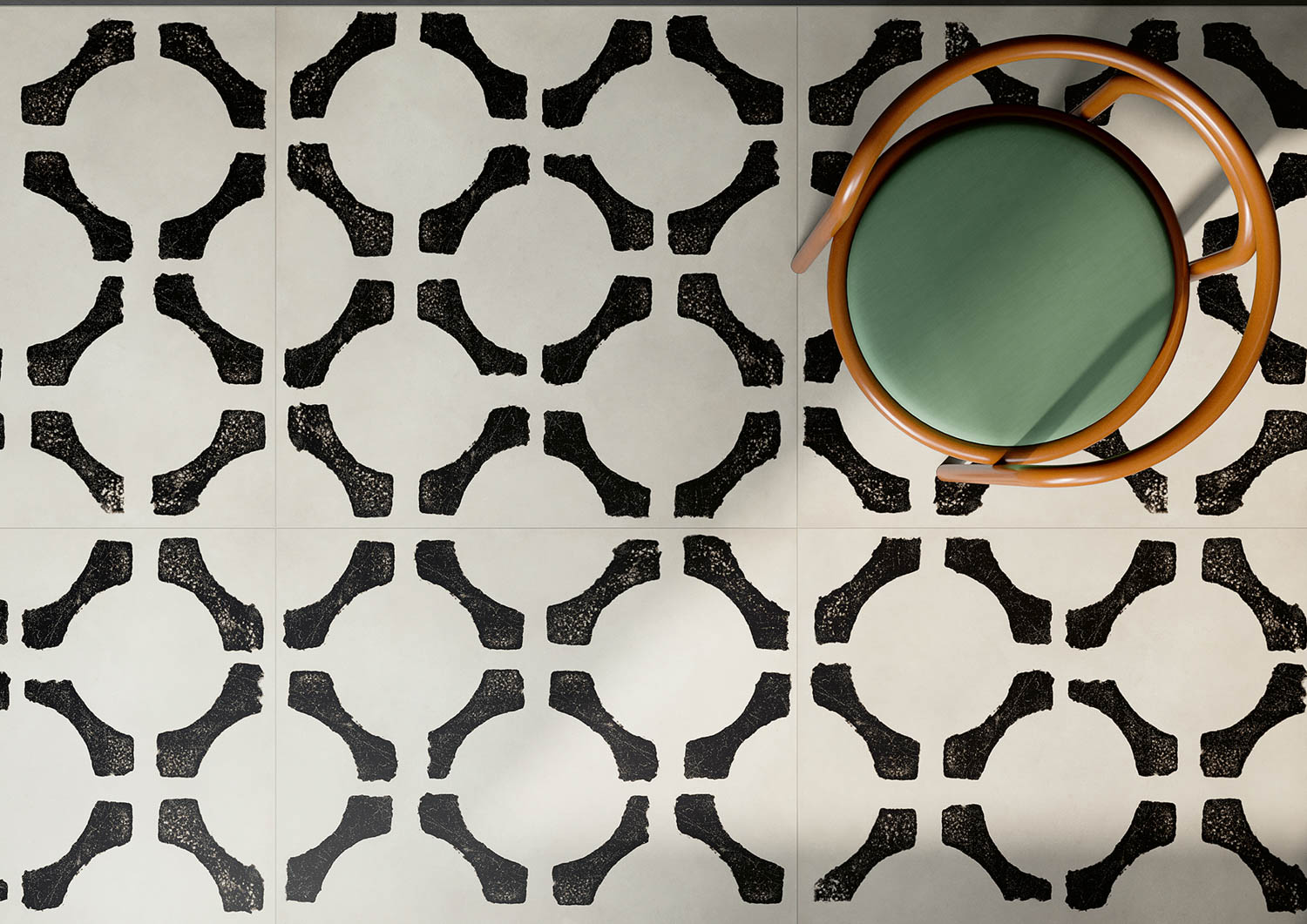 a black and white circular pattern tile