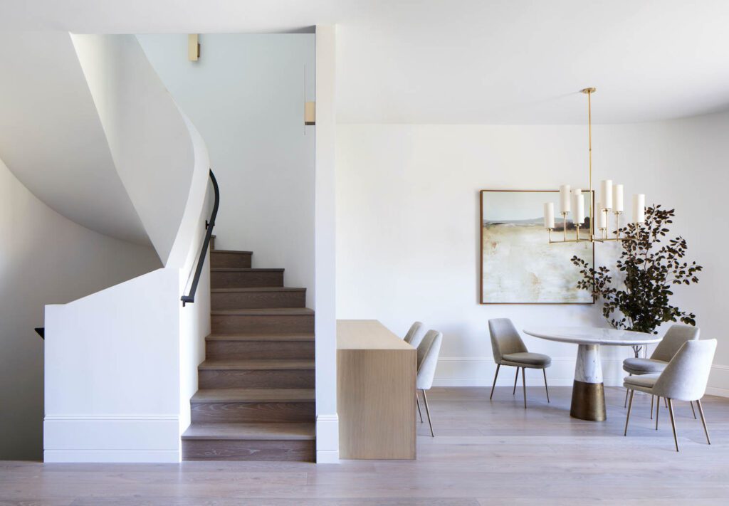 The central interior stair sits at the core of the house.